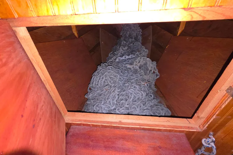 Slide: The Image of Wooden boat interior with anchor chain storage, Glen-L 44, 2006 model. - 54