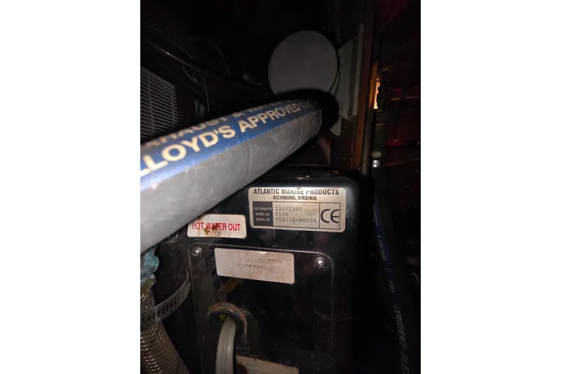 Slide: The Image of Engine compartment of a 2006 Glen-L 44 boat, featuring Atlantic Marine Products equipment. - 67