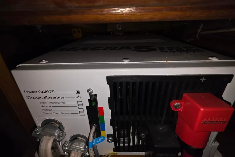 Slide: The Image of Magnum inverter in a 2006 Glen-L 44 boat, showing power and charging controls. - 68