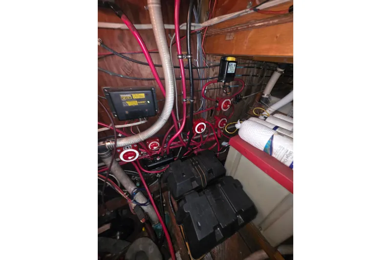 Slide: The Image of Electrical wiring and components inside a 2006 Glen-L 44 boat. - 73