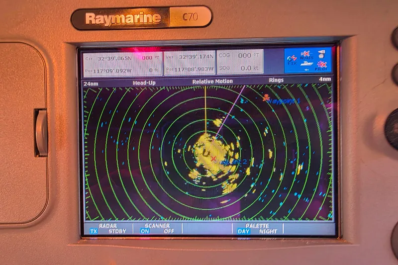 Slide: The Image of Raymarine C70 radar display on Glen-L 44, 2006 model, showing navigation data and waypoints. - 77