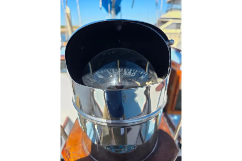 Slide: The Image of Compass on Glen-L 44 boat, 2006 model, with reflective chrome casing. - 99