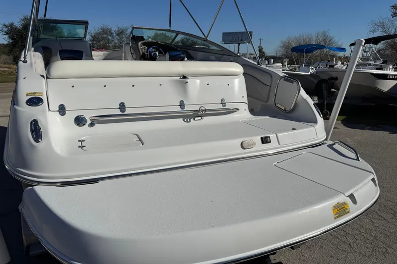 Slide: The Image of 2005 Crownline 236 LS boat, rear view with seating and swim platform. - 5