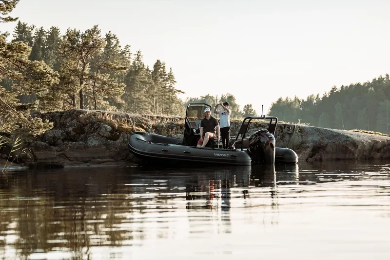 Slide: The Image of Highfield Patrol 540 boat by a lakeside, 2026 model. - 10