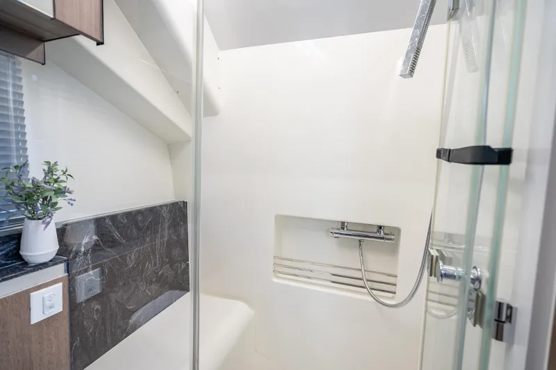 Slide: The Image of Modern bathroom interior on 2023 Galeon 375 GTO yacht, featuring sleek shower design. - 14