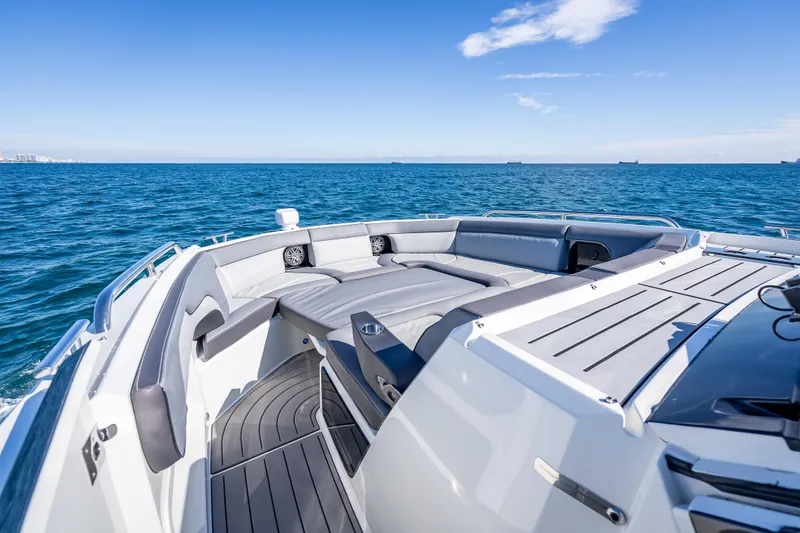 Slide: The Image of 2023 Galeon 375 GTO luxury yacht on open sea, featuring sleek design and spacious deck. - 24