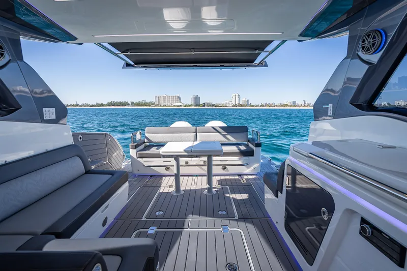 Slide: The Image of Luxurious 2023 Galeon 375 GTO yacht interior with ocean view and modern seating area. - 28