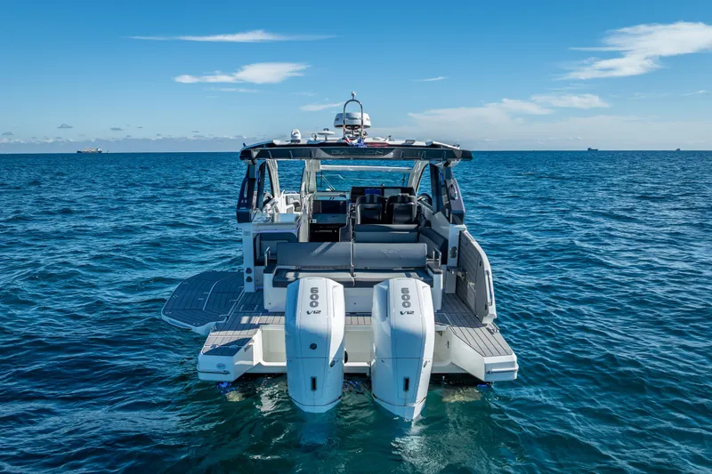 Slide: The Image of 2023 Galeon 375 GTO yacht on open sea with twin engines, rear view. - 3