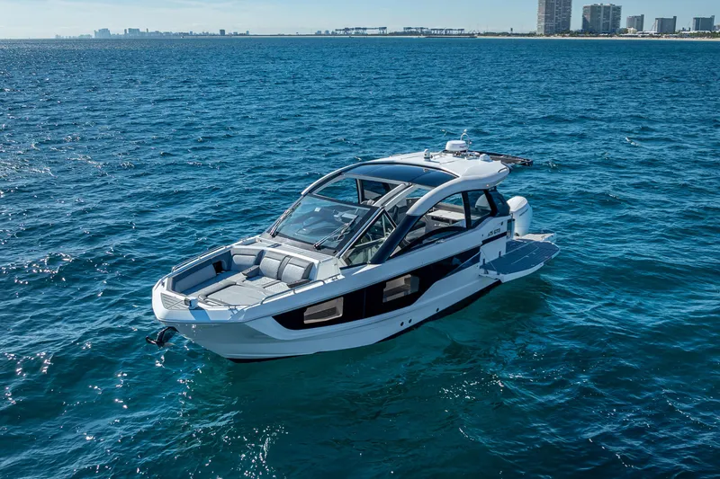 Slide: The Image of 2023 Galeon 375 GTO luxury yacht cruising on open blue waters. - 6