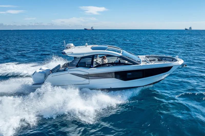 Slide: The Image of 2023 Galeon 375 GTO luxury yacht cruising on open sea. - 9