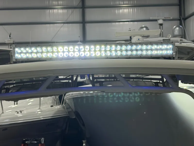 Slide: The Image of 2019 Sailfish 275 DC boat docked with Yamaha engines. - 33