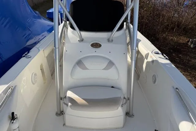 Slide: The Image of 2008 Boston Whaler 270 Outrage boat interior with seating and console. - 15