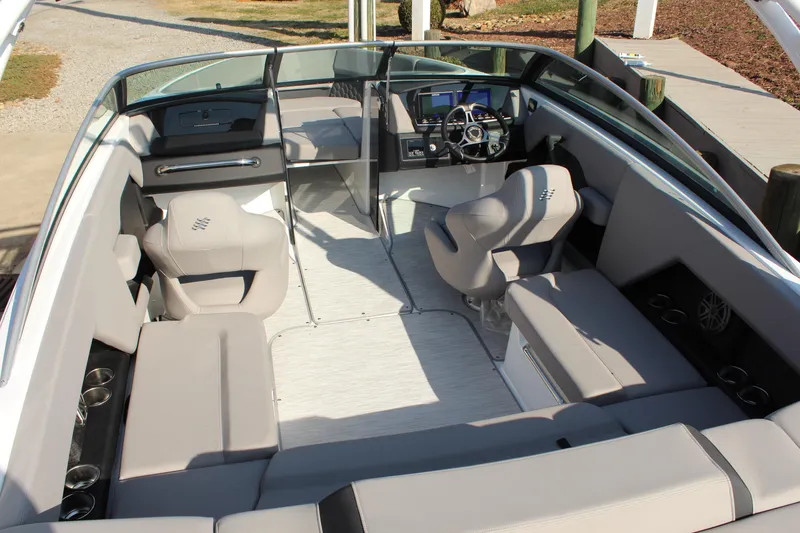 Slide: The Image of Interior of 2026 Four Winns H4 boat with modern seating and dashboard. - 17