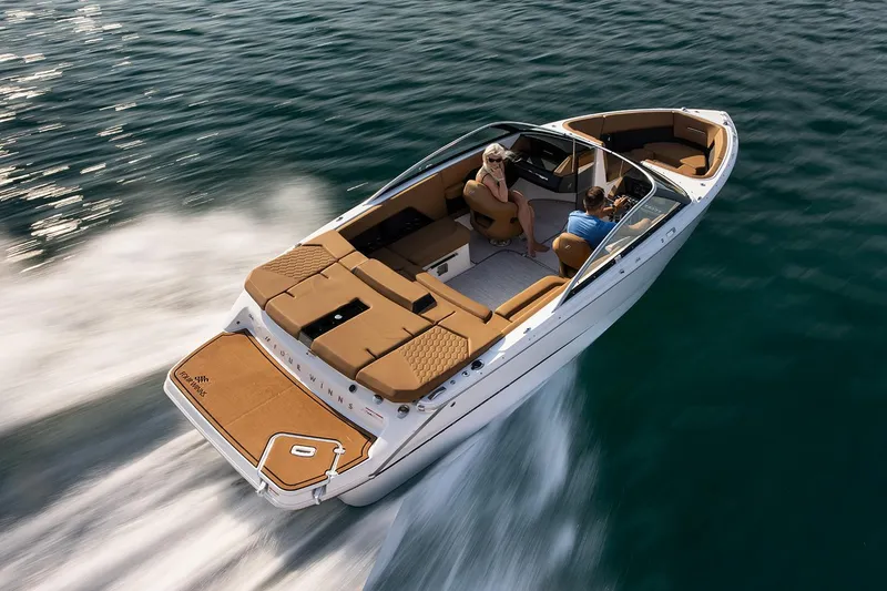 Slide: The Image of Manufacturer Provided Image: 2025 Four Winns H4 boat cruising on open water, showcasing sleek design and luxury features. - 38