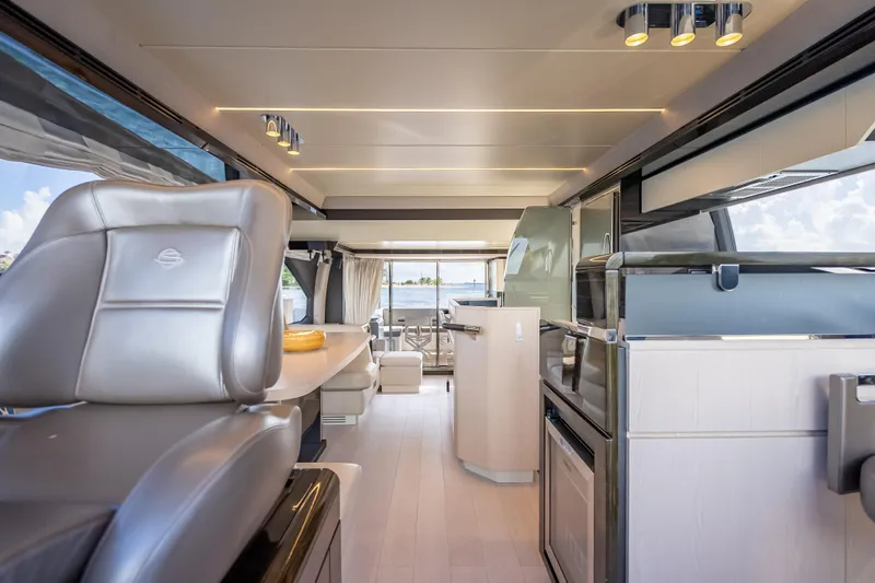 Slide: The Image of Luxurious interior of a 2019 Azimut 66 yacht, featuring modern design and elegant furnishings. - 109