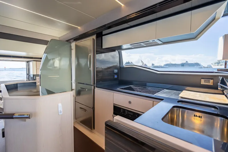 Slide: The Image of Luxurious kitchen interior of 2019 Azimut 66 yacht with modern appliances and ocean view. - 112