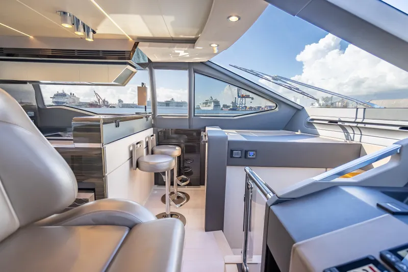 Slide: The Image of Luxurious interior of 2019 Azimut 66 yacht with modern helm and seating. - 117