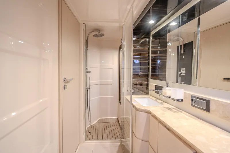 Slide: The Image of Luxurious bathroom interior of 2019 Azimut 66 yacht with modern shower and sleek design. - 57
