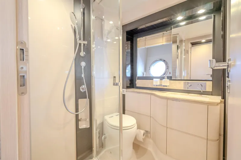 Slide: The Image of Luxurious bathroom in 2019 Azimut 66 yacht with modern shower and elegant fixtures. - 63