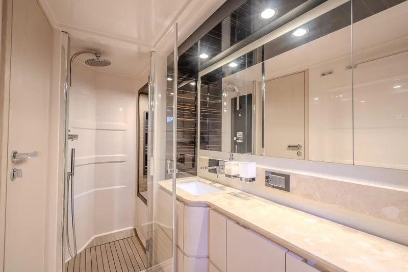 Slide: The Image of Luxurious bathroom in 2019 Azimut 66 yacht with modern fixtures and elegant design. - 86