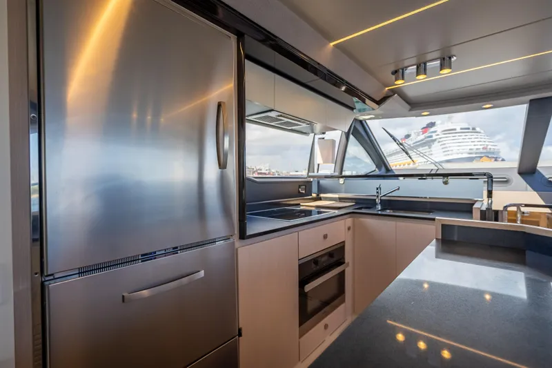 Slide: The Image of Luxurious kitchen interior of 2019 Azimut 66 yacht with modern appliances and ocean view. - 92