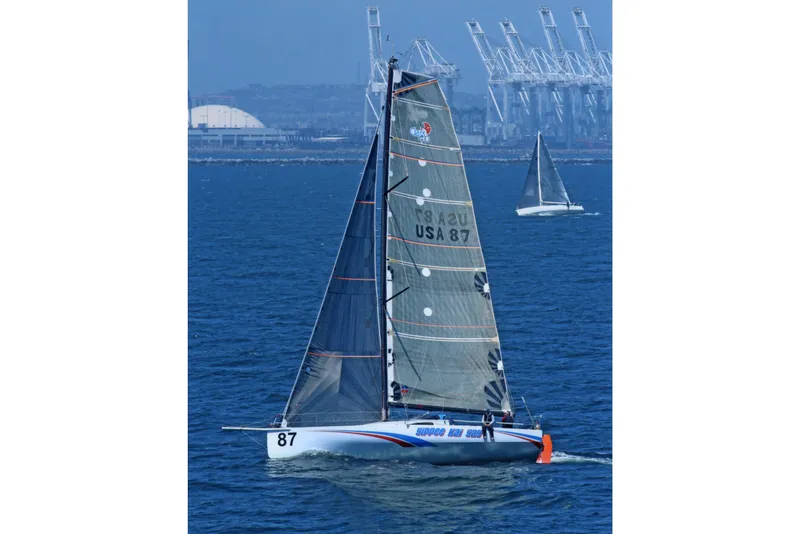 Slide: The Image of Sailing yacht "Open Class 40 Antrim Design" on blue ocean, 2009 model. - 1