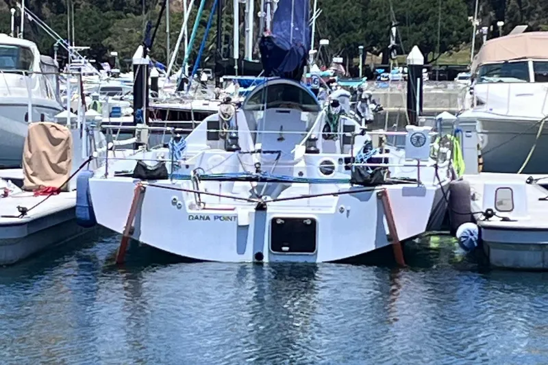 Slide: The Image of 2009 Class 40 Antrim Design sailboat docked in marina. - 10