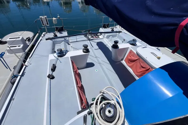 Slide: The Image of 2009 Class 40 Open Antrim Design sailboat deck with winches and ropes. - 12