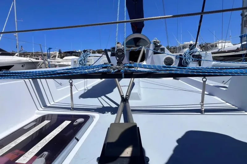 Slide: The Image of 2009 Class 40 Open Antrim Design sailboat deck with rigging and ropes in marina. - 14