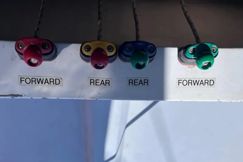 Slide: The Image of Control panel with labeled switches on a 2009 Class 40 Open Antrim Design boat. - 19