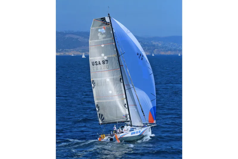 Slide: The Image of Sailing yacht "USA 87" Class 40 Open Antrim Design, 2009, navigating blue ocean waters. - 2
