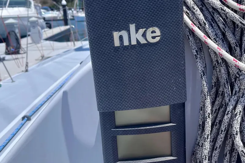 Slide: The Image of Close-up of 2009 Class 40 Open Antrim Design sailboat with "nke" display. - 20