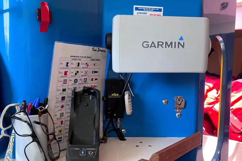 Slide: The Image of Navigation equipment inside a 2009 Class 40 Open Antrim Design boat, featuring Garmin technology. - 23