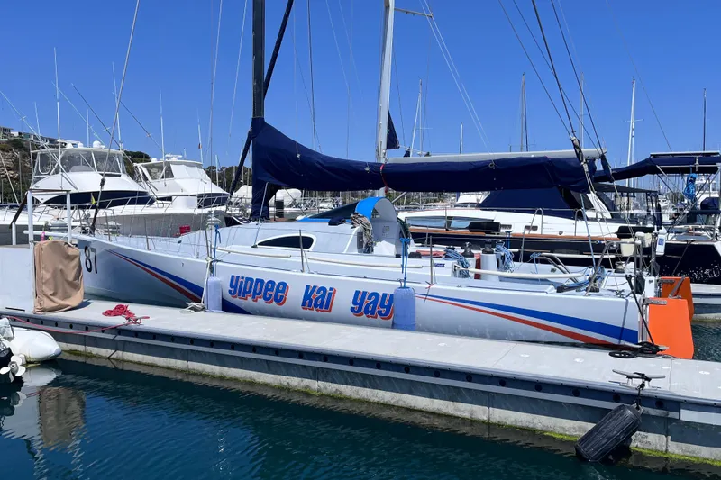 Slide: The Image of Sailboat "Yippee Kai Yay" docked, 2009 Class 40 Open Antrim Design, marina setting. - 4