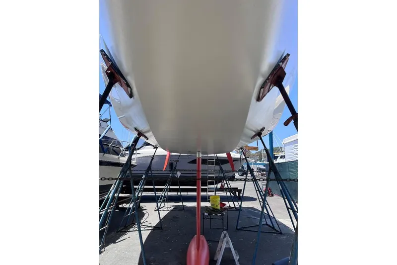 Slide: The Image of 2009 Class 40 Open Antrim Design sailboat under maintenance in a boatyard. - 8
