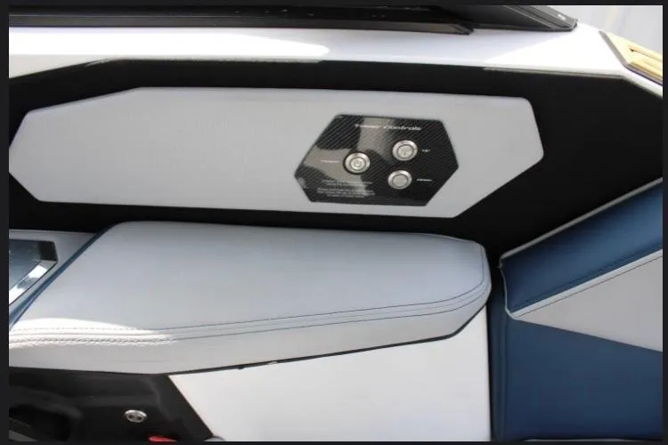 Slide: The Image of Interior view of 2022 Nautique Super Air Nautique S23 boat with control panel. - 7