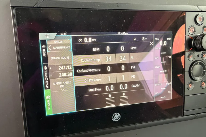 Slide: The Image of Axopar 37 XC Cross Cabin 2021 dashboard display showing engine metrics and maintenance data. - 19