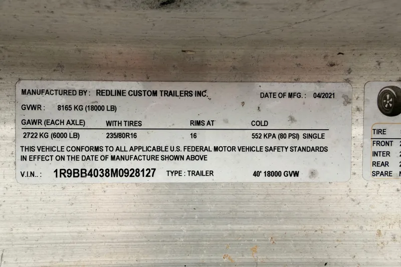 Slide: The Image of Label on Redline Custom Trailers, 2021, showing specifications and compliance details. - 30