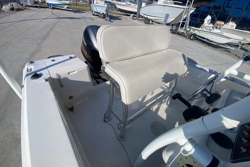 Slide: The Image of 1996 Pro-Line 170 Center Console boat interior with seating and controls. - 13