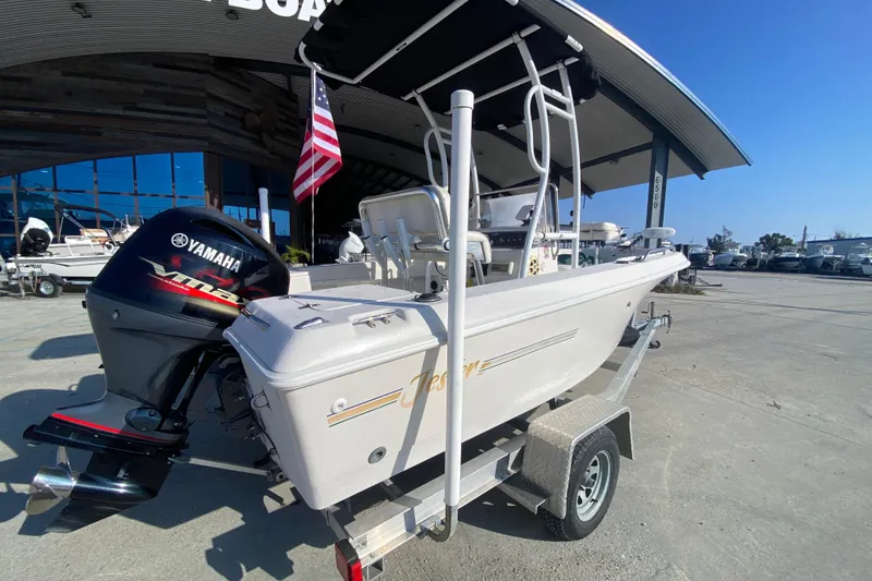 Slide: The Image of 1996 Pro-Line 170 Center Console boat with Yamaha engine on trailer, outdoor display. - 4