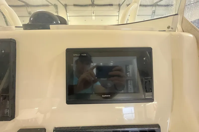Slide: The Image of Garmin GPSmap 7608 on 2015 Regulator 25 boat dashboard. - 37