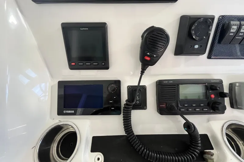 Slide: The Image of Control panel of a 2015 Regulator 25 boat with Garmin and Yamaha electronics. - 39