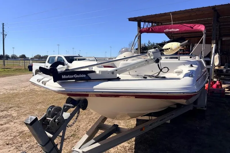 Slide: The Image of 2007 Hurricane FunDeck GS 201 OB boat on trailer with MotorGuide trolling motor. - 2
