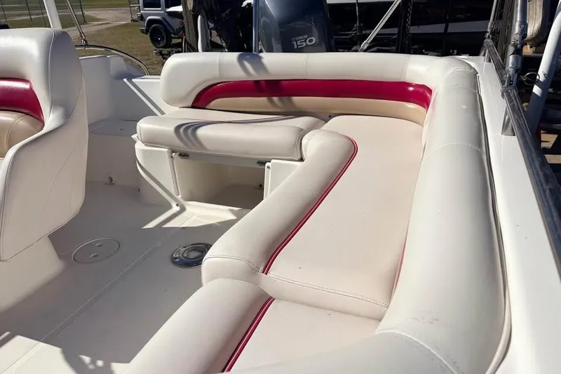 Slide: The Image of 2007 Hurricane FunDeck GS 201 OB boat interior with white and red seating. - 5