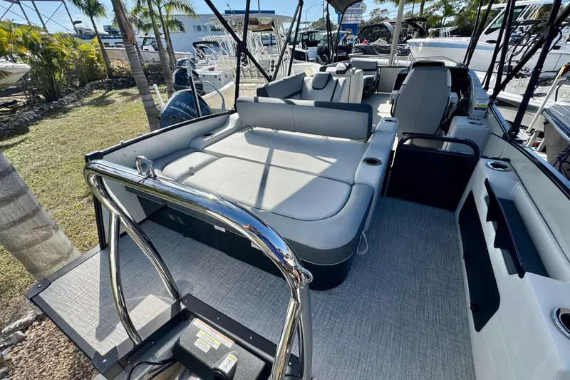 Slide: The Image of 2026 Avalon Catalina Platinum Versatile Rear Bench boat with luxurious seating and modern design. - 10