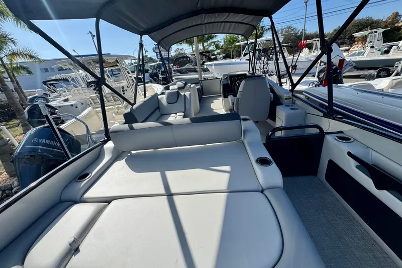 Slide: The Image of 2026 Avalon Catalina Platinum Versatile Rear Bench boat with spacious seating and Yamaha engine. - 13