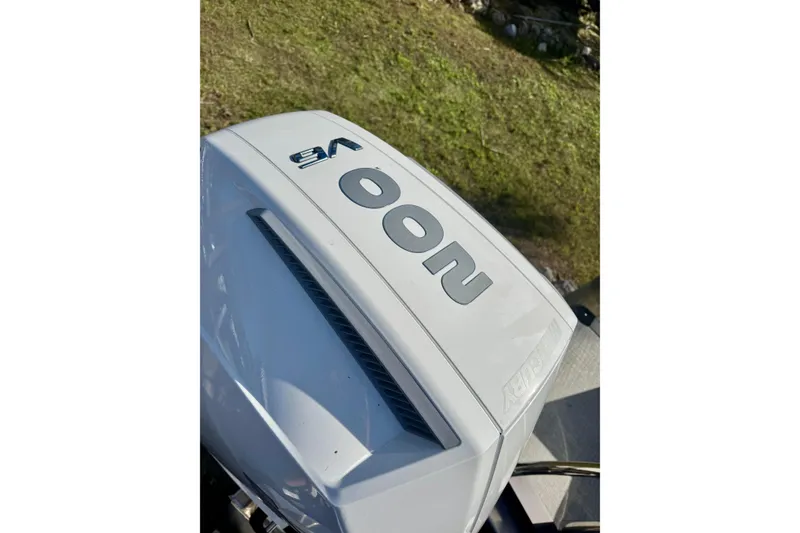 Slide: The Image of 2026 Avalon Catalina Platinum Versatile Rear Bench boat engine detail. - 9