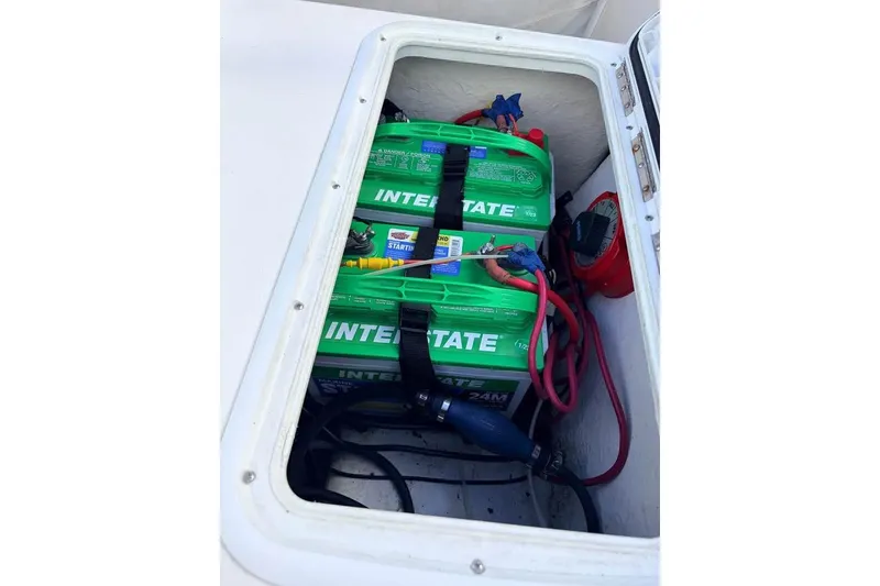 Slide: The Image of Battery compartment of a 2003 Sea Chaser 1900 CC boat with Interstate batteries. - 6