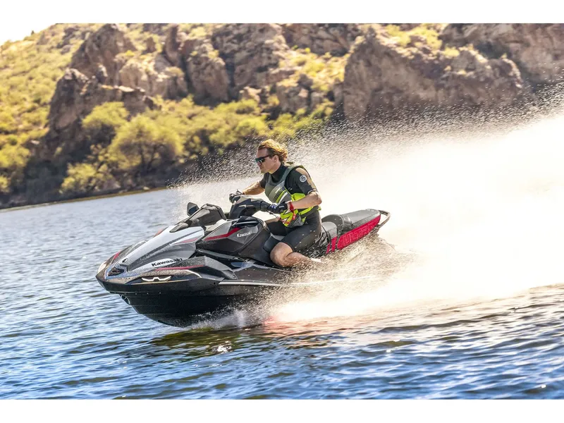 Slide: The Image of 2026 Kawasaki Jet Ski Ultra 160LX-S in a showroom. - 5