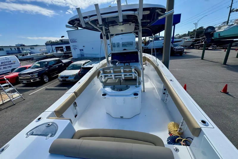 Slide: The Image of 2017 Sportsman Heritage 251 Center Console boat at a dealership, showcasing interior and exterior features. - 14